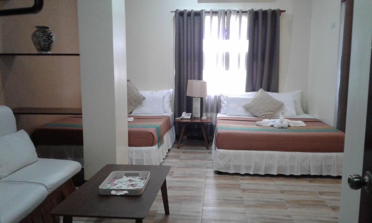 Отель Charos Dormitel Dumaguete City Экстерьер фото