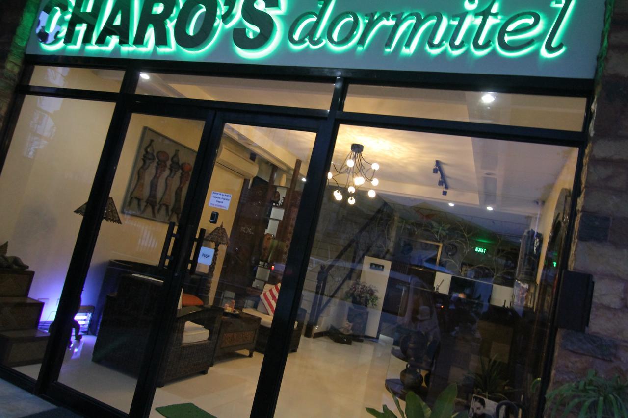 Отель Charos Dormitel Dumaguete City Экстерьер фото